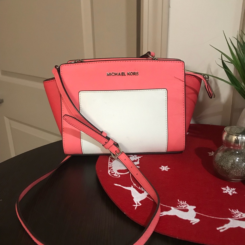 Pink and white Michael Kors cross body purse